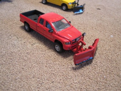 toy pickup truck with snow plow