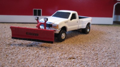 toy pickup truck with snow plow